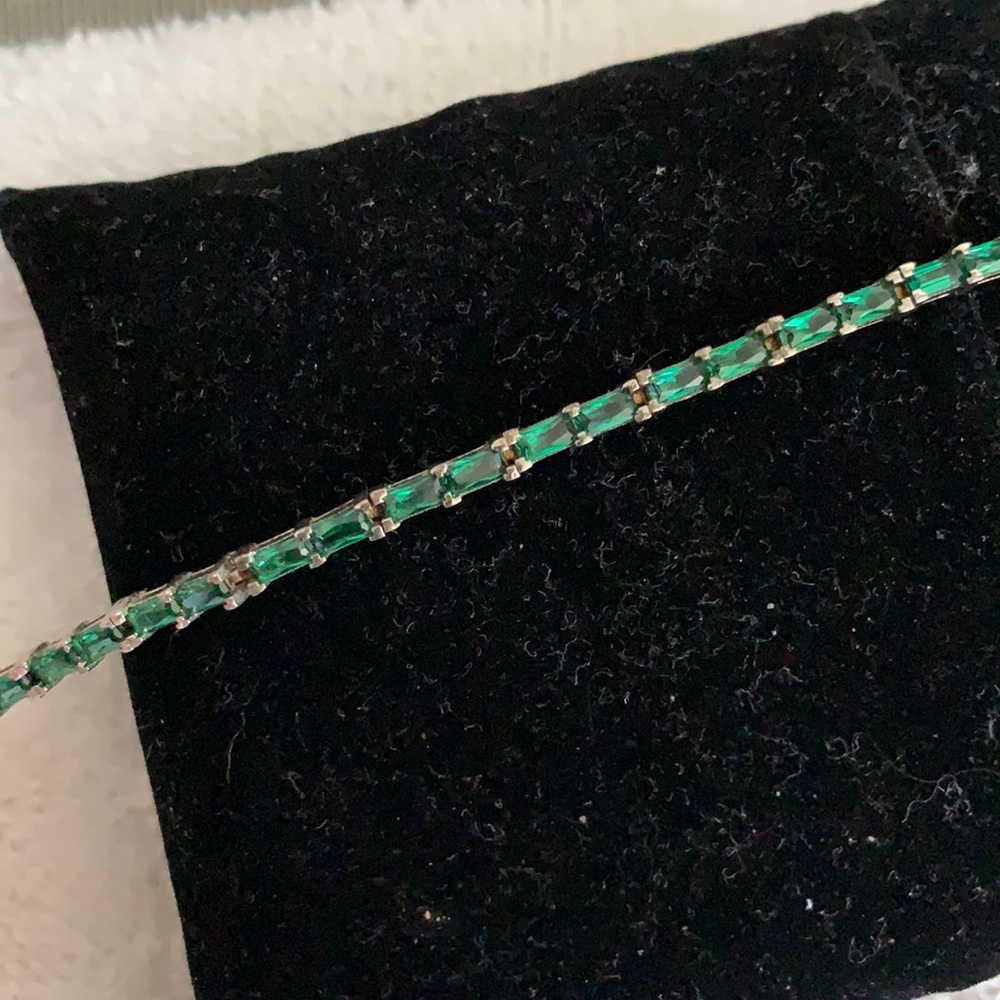 Sterling silver but I still it with green stone